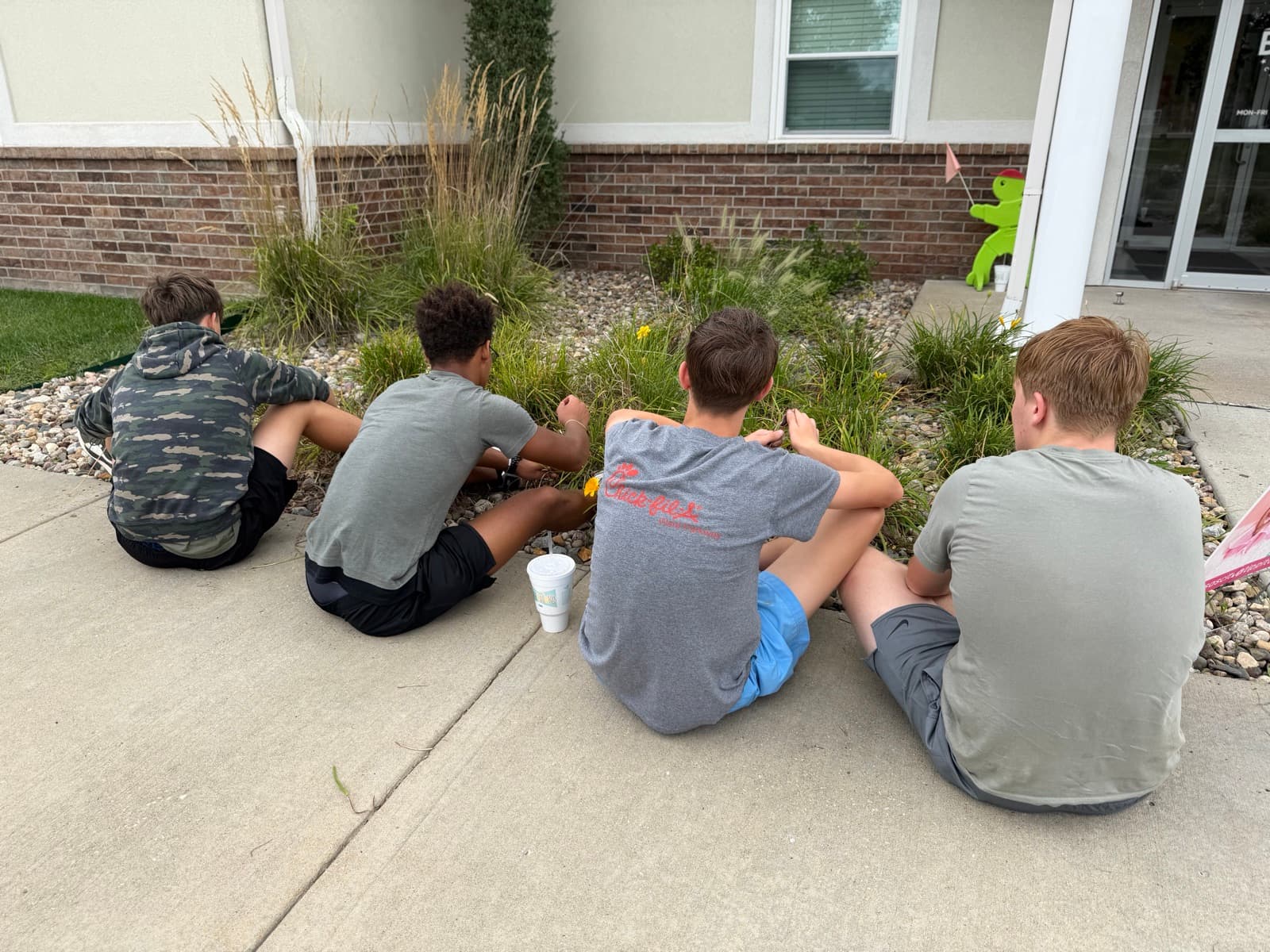 Residents taking a break outside during a lunch outing